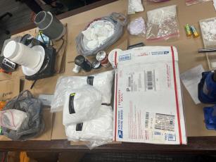 Via a series of undercover controlled purchases, law enforcement officers seized hundreds of grams of illegal drugs and six firearms. Submitted photo