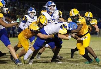 The Fernandina Beach and Yulee high schools’ football teams, pictured in action last season, kick off the 2023 season tonight with preseason Kickoff Classics at home. The FBHS Pirates host Hilliard, and the YHS Hornets are at home with Englewood. Kickoff is at 7 p.m. for both games. Photo by Beth Jones/News-Leader