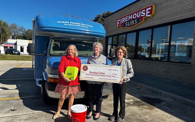 Pictured are, from left, Barnabas President and CEO Jamie Reynolds, Barnabas board member Liza Cotter and executive director at Firehouse Subs Public Safety Foundation, Robin Peters. Photo by Sean Rosenthal