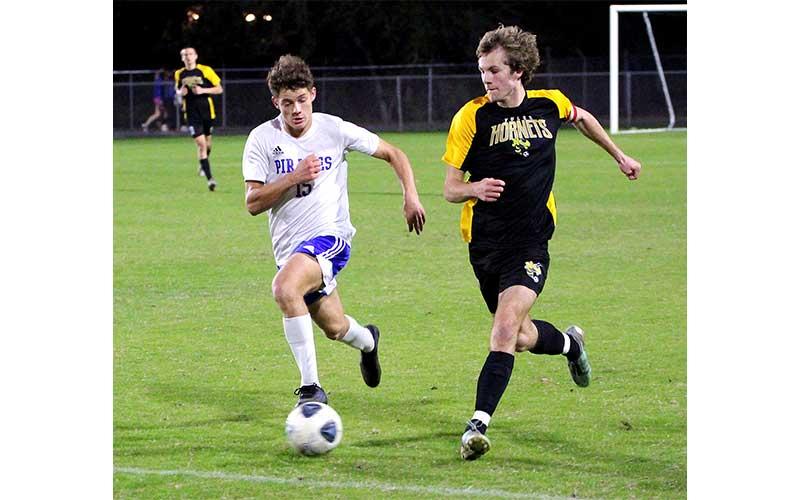 Hornets edge Pirates in district semifinal match. Photos by Beth Jones/News-Leader