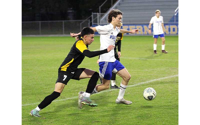 Hornets edge Pirates in district semifinal match. Photos by Beth Jones/News-Leader